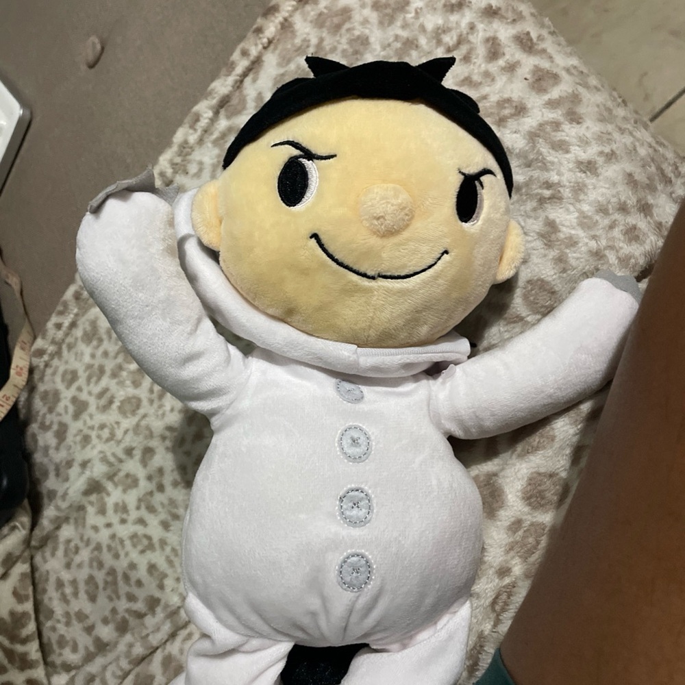 White and Black Plush Doll